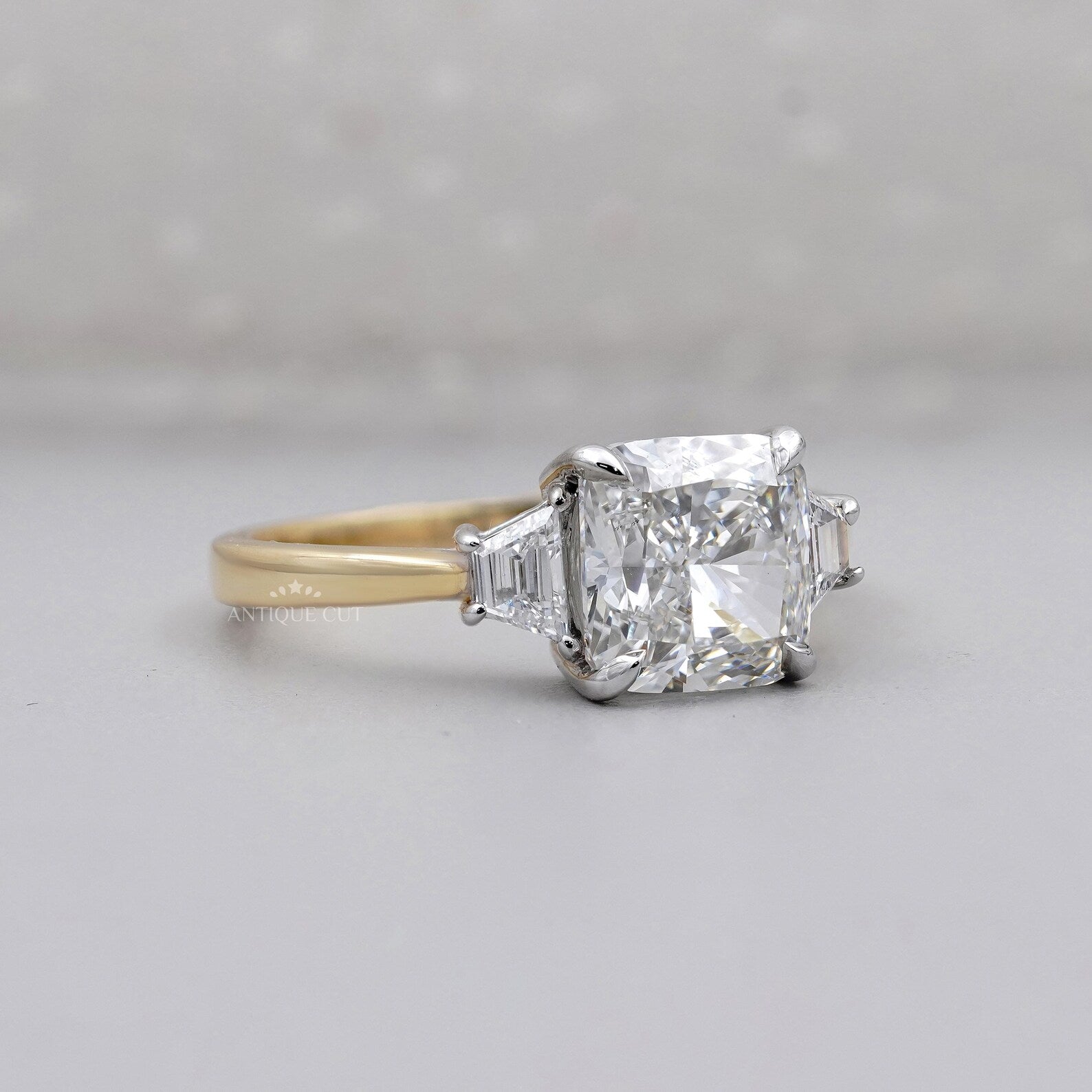 Cushion Cut 3.10tcw Lab-Grown Diamond Three-Stone Ring | Baguette Side Stones | Two-Tone Gold Setting | IGI Certified