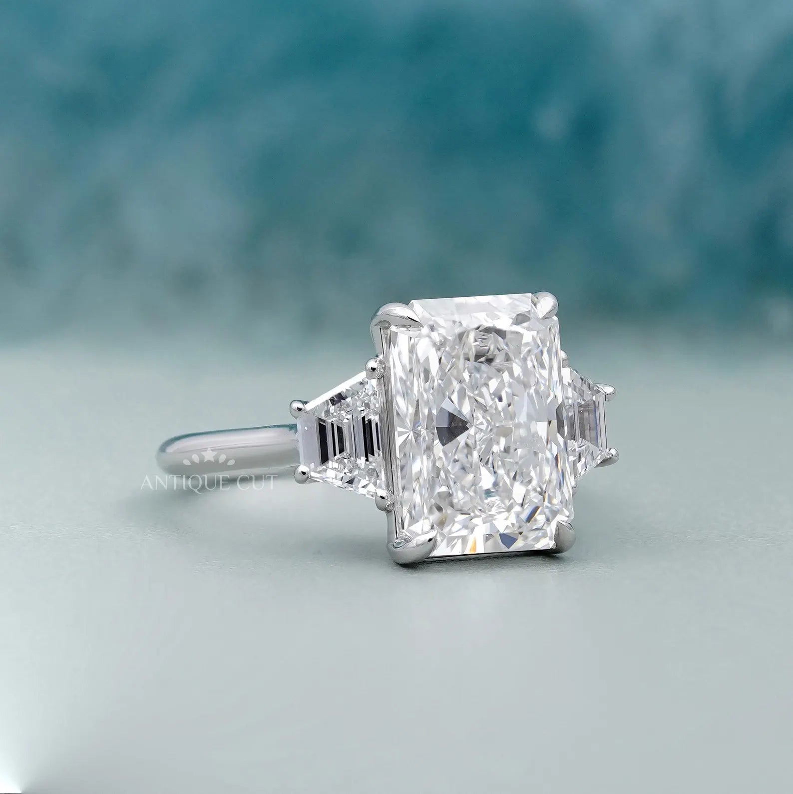 Radiant 5.97tcw Lab Grown Diamond Three-Stone Engagement Ring | Trapezoid Side Stones | D–F Color | VVS–VS Clarity