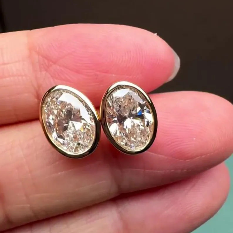 Oval 4.00tcw Lab Grown Diamond Bezel Set Stud Earring, D-E-F Color, VVS-VS Clarity - IGI Certified