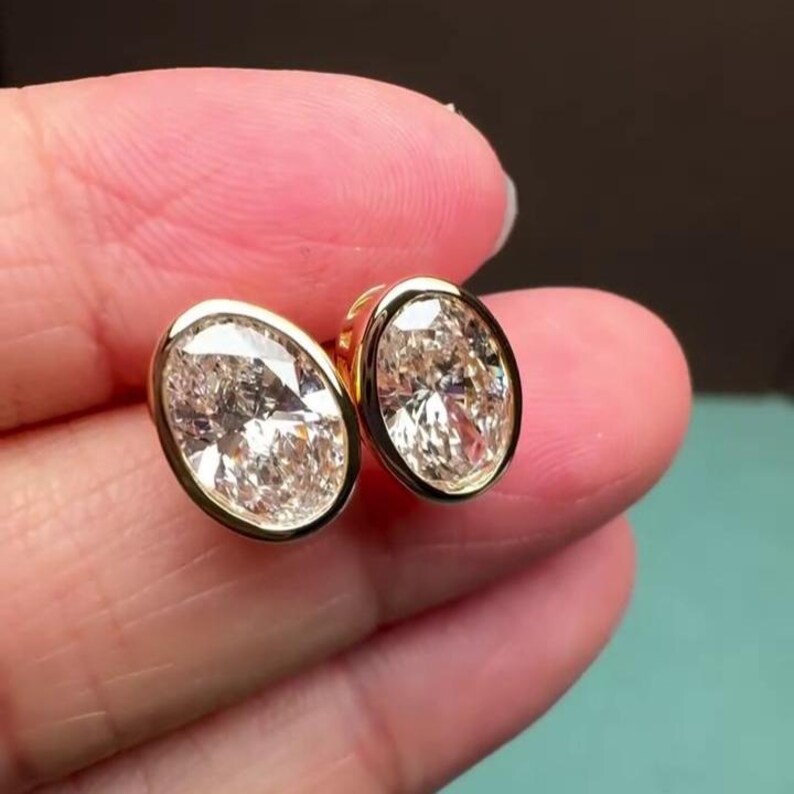 Oval 4.00tcw Lab Grown Diamond Bezel Set Stud Earring, D-E-F Color, VVS-VS Clarity - IGI Certified