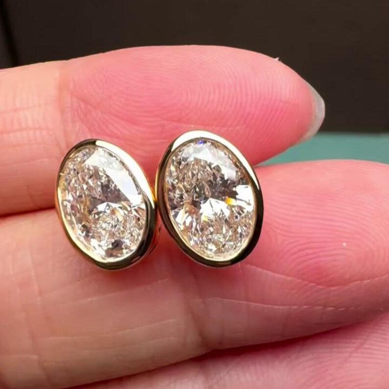 Oval 4.00tcw Lab Grown Diamond Bezel Set Stud Earring, D-E-F Color, VVS-VS Clarity - IGI Certified
