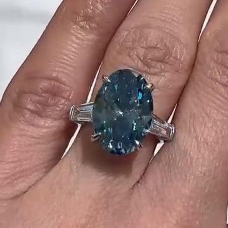 Oval Fancy Blue 8.50tcw Lab Diamond Ring | Three Stone Baguette Sides | Cathedral Shank | IGI Certified VVS–VS
