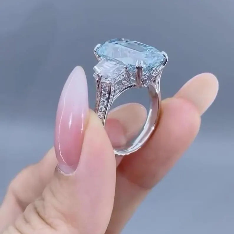 Fancy Blue Emerald 6.50tcw Lab Grown Diamond Three Stone Ring | IGI Certified VVS–VS