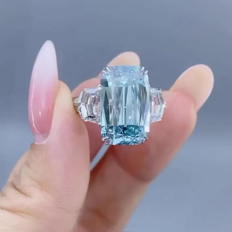 Fancy Blue Emerald 6.50tcw Lab Grown Diamond Three Stone Ring | IGI Certified VVS–VS