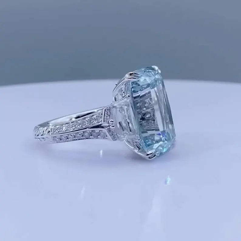 Fancy Blue Emerald 6.50tcw Lab Grown Diamond Three Stone Ring | IGI Certified VVS–VS
