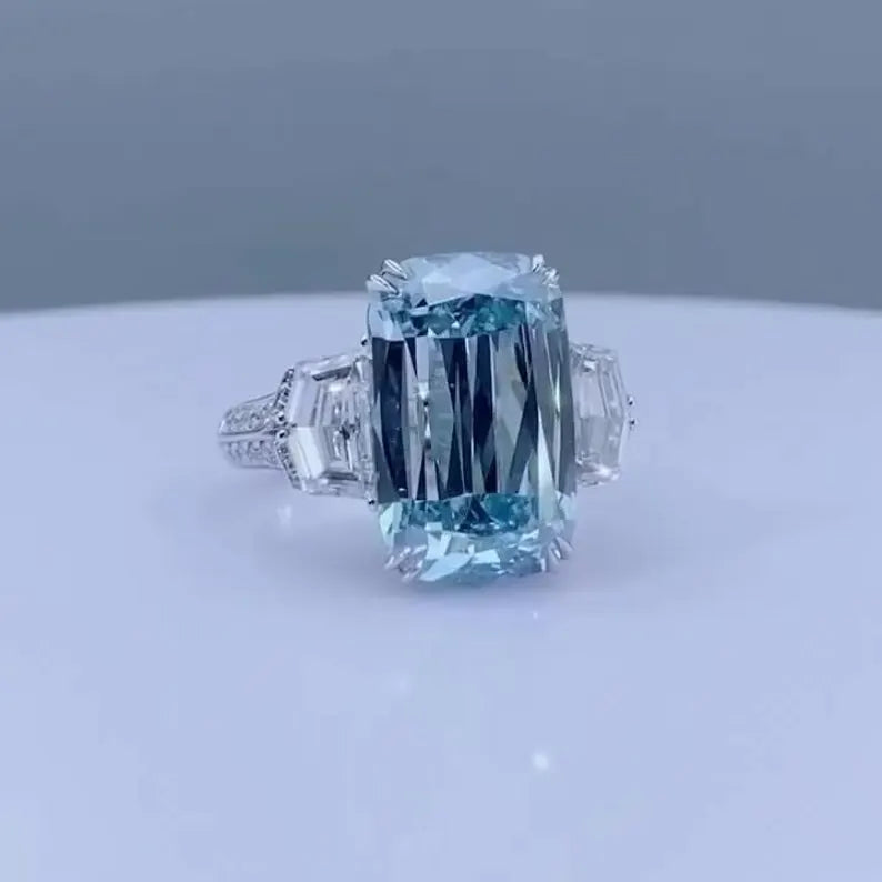 Fancy Blue Emerald 6.50tcw Lab Grown Diamond Three Stone Ring | IGI Certified VVS–VS