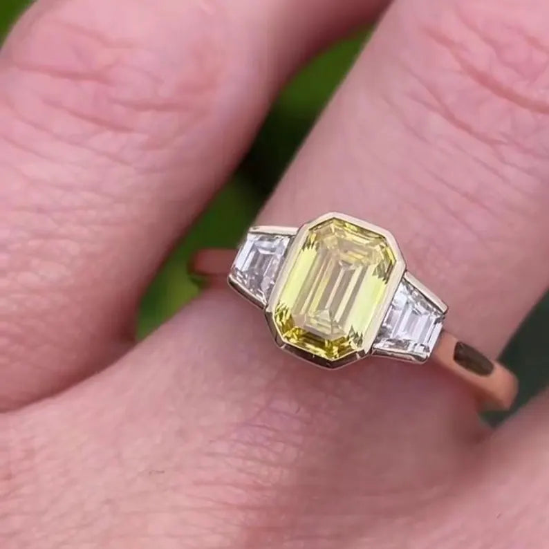 Fancy Yellow Emerald 1.50tcw Lab Grown Diamond Three Stone Ring | IGI Certified VVS–VS