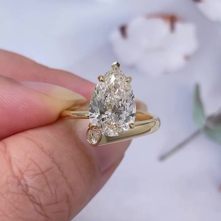 Pear 5.50tcw Lab Diamond Bypass Engagement Ring | IGI Certified | D-E-F | VVS–VS