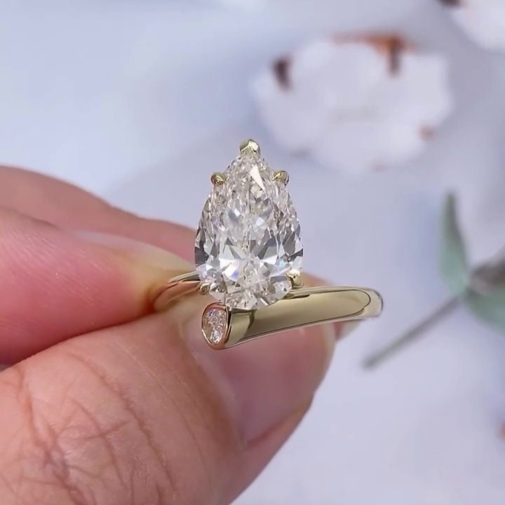 Pear 5.50tcw Lab Diamond Bypass Engagement Ring | IGI Certified | D-E-F | VVS–VS