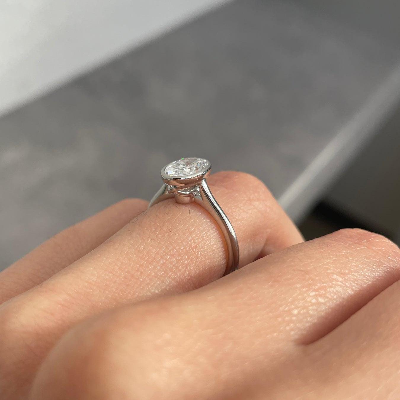 1.50 Carat Oval Lab-Grown Diamond Engagement Ring | Bezel Set | IGI Certified | DEF Color