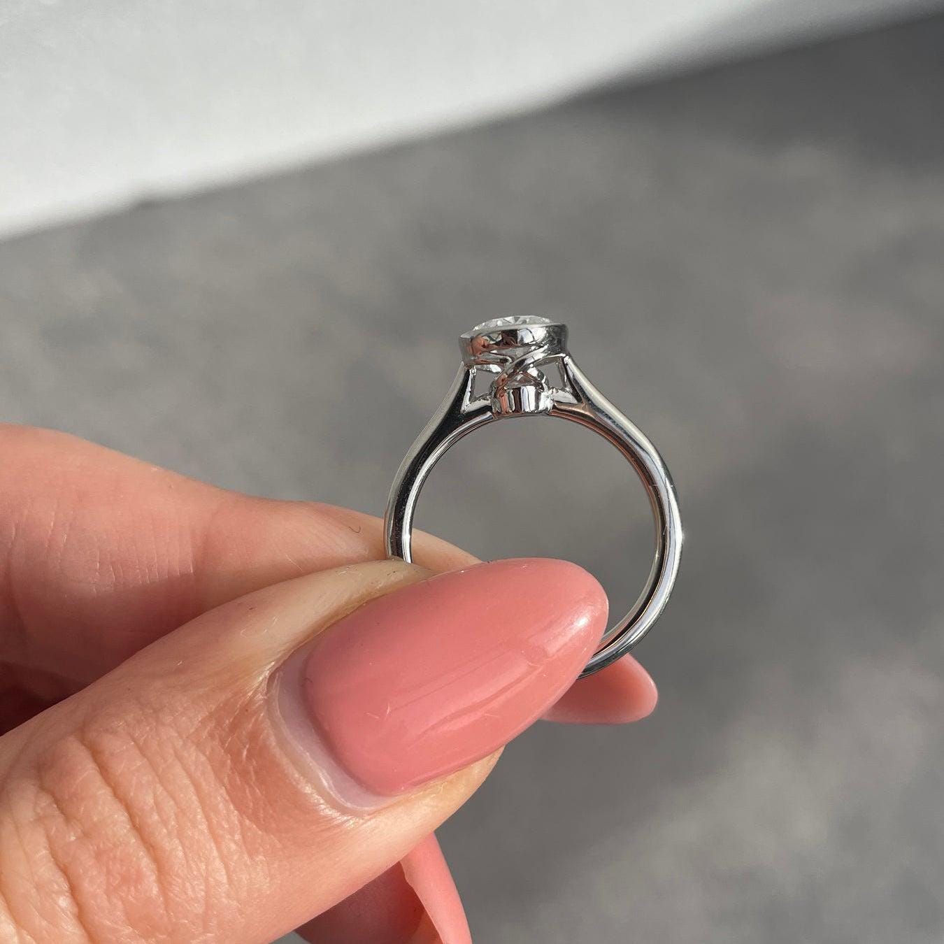 1.50 Carat Oval Lab-Grown Diamond Engagement Ring | Bezel Set | IGI Certified | DEF Color