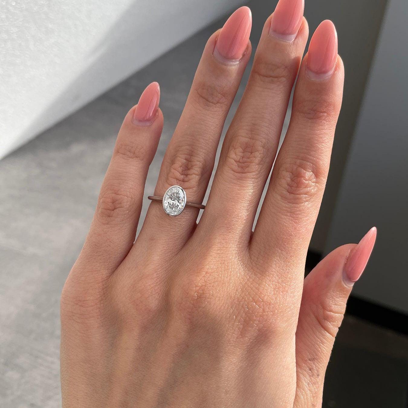 1.50 Carat Oval Lab-Grown Diamond Engagement Ring | Bezel Set | IGI Certified | DEF Color