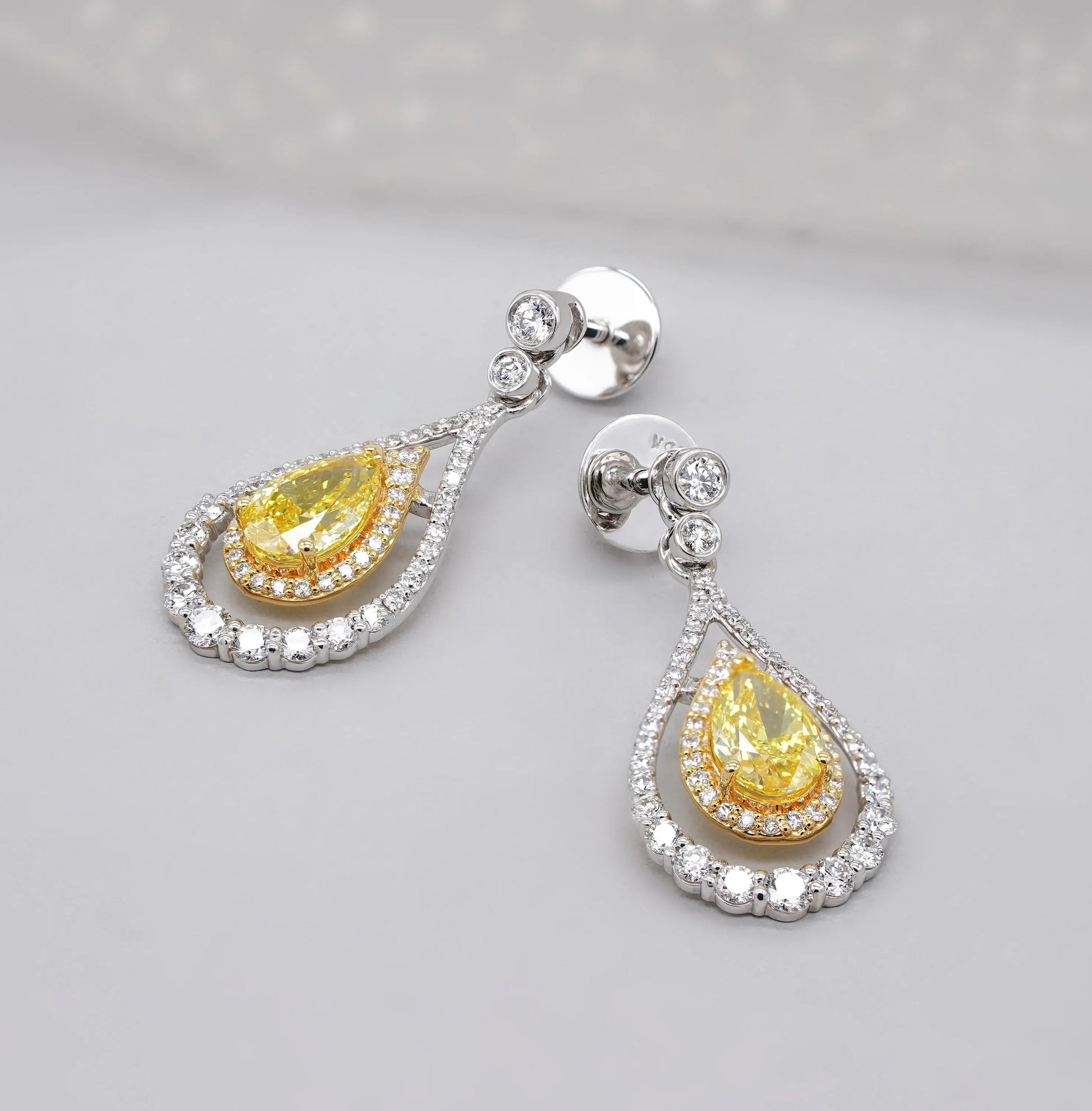 Pear-Shaped 3.47tcw Yellow Lab Diamond Double Halo Drop Earrings | IGI Certified