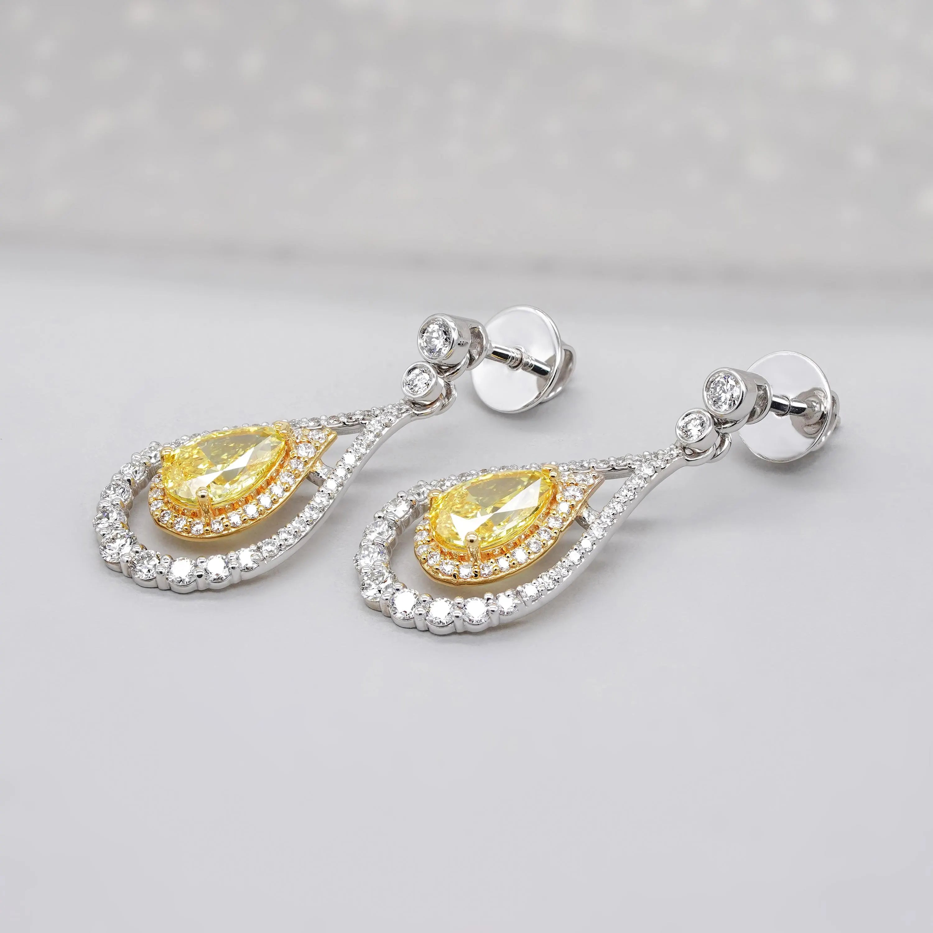 Pear-Shaped 3.47tcw Yellow Lab Diamond Double Halo Drop Earrings | IGI Certified