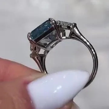 Radiant 8.00tcw Fancy Blue Lab Grown Diamond Ring | Three Stone Design with 1.00ct Cadillac Side Stones | IGI Certified | VVS-VS Clarity