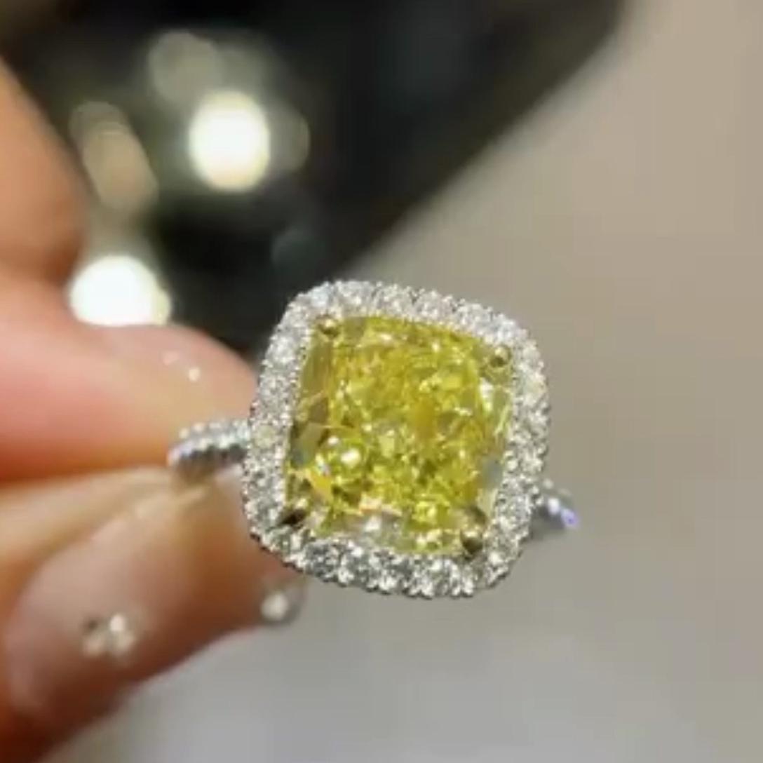 Fancy Yellow 5.00tcw Cushion Lab Diamond Halo Engagement Ring | 4ct Center | IGI Certified