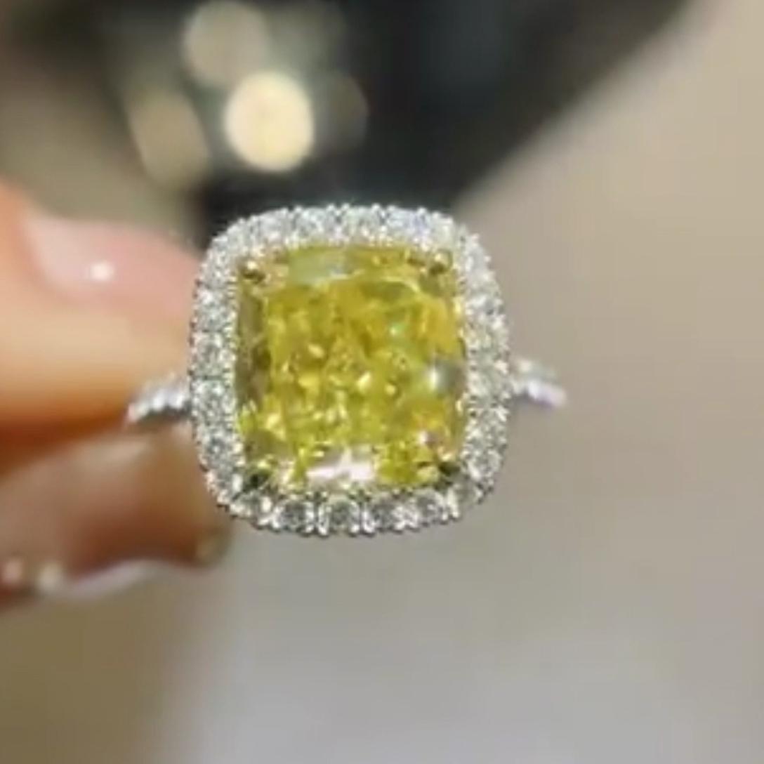Fancy Yellow 5.00tcw Cushion Lab Diamond Halo Engagement Ring | 4ct Center | IGI Certified