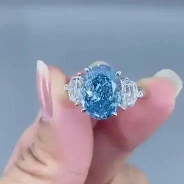 Oval 5.00tcw Fancy Blue Lab-Grown Diamond Engagement Ring | 3-Stone Style | IGI Certified