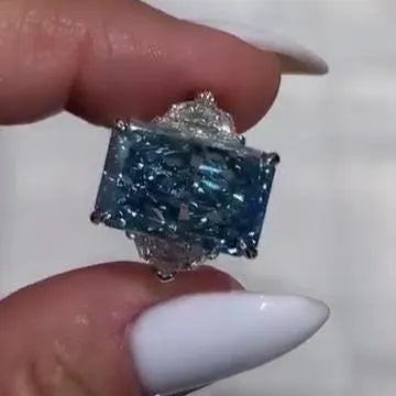 Radiant 8.00tcw Fancy Blue Lab Grown Diamond Ring | Three Stone Design with 1.00ct Cadillac Side Stones | IGI Certified | VVS-VS Clarity
