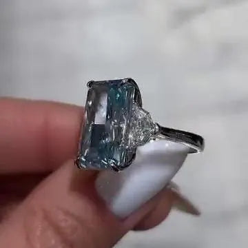 Radiant 8.00tcw Fancy Blue Lab Grown Diamond Ring | Three Stone Design with 1.00ct Cadillac Side Stones | IGI Certified | VVS-VS Clarity