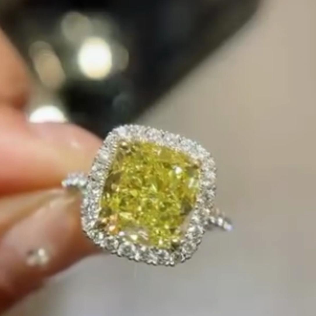 Fancy Yellow 5.00tcw Cushion Lab Diamond Halo Engagement Ring | 4ct Center | IGI Certified