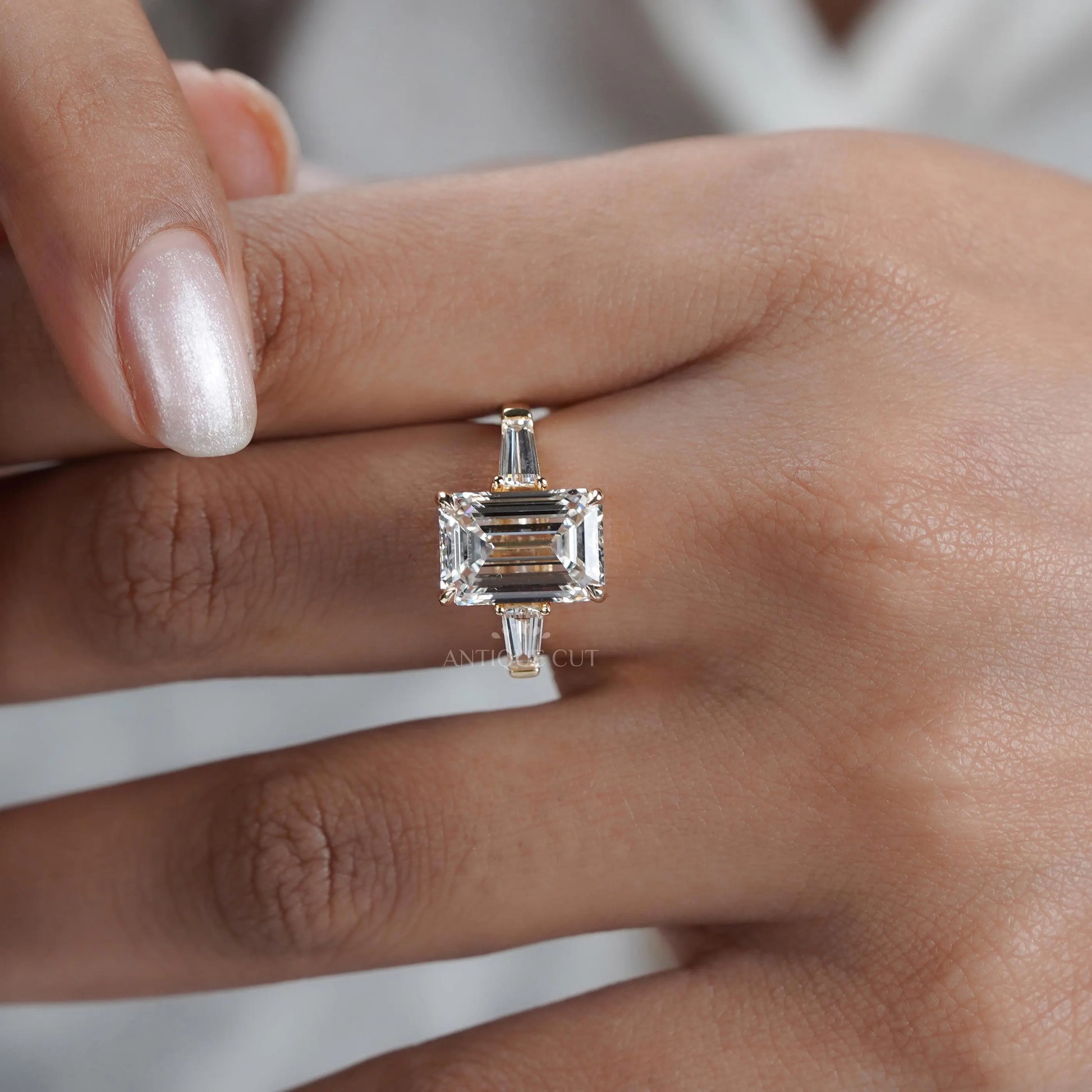 Emerald 5.60tcw Lab Diamond Three Stone Engagement Ring | Tap Baguette Side | IGI Certified