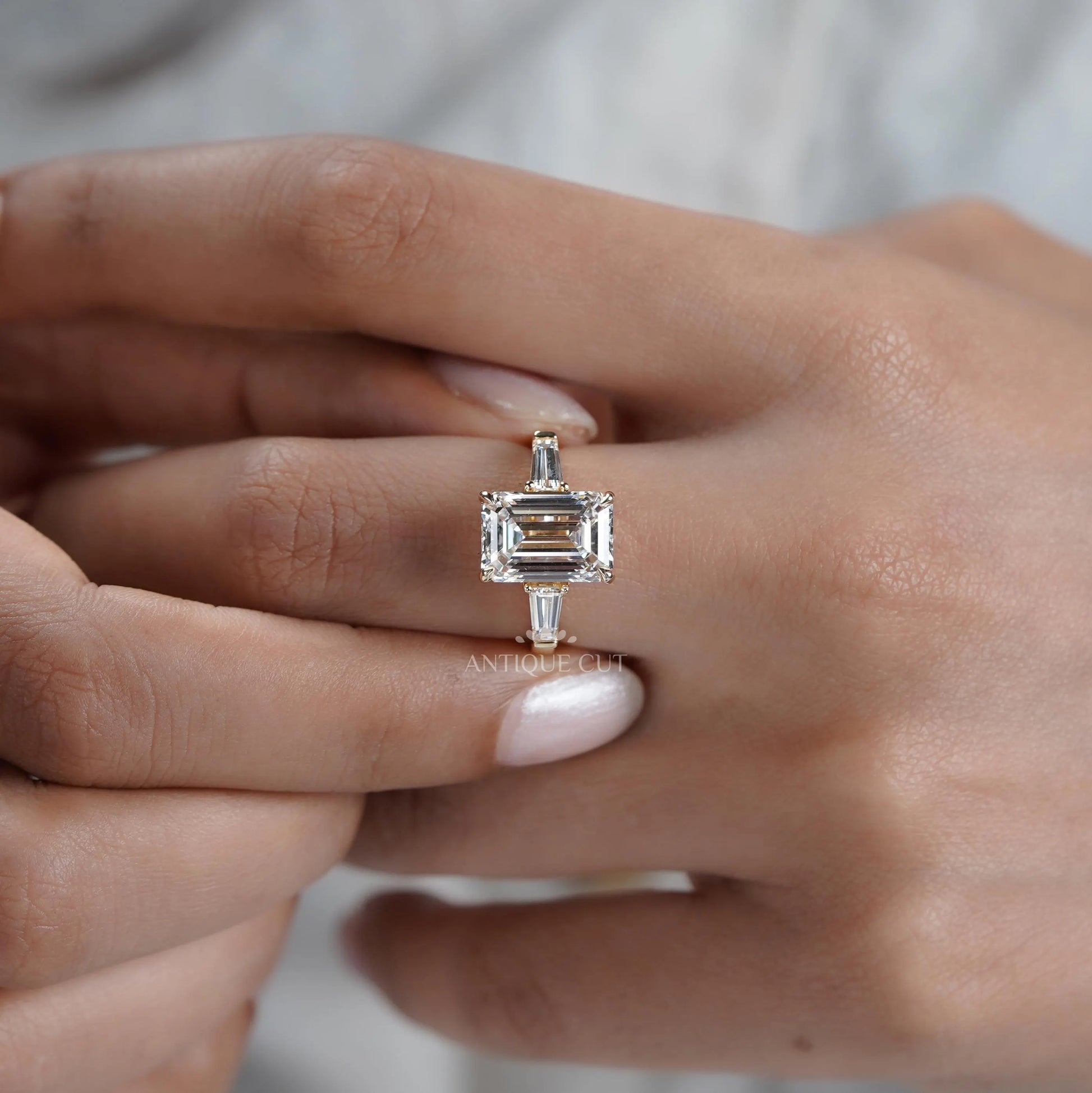 Emerald 5.60tcw Lab Diamond Three Stone Engagement Ring | Tap Baguette Side | IGI Certified