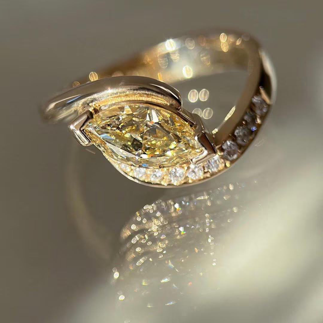 1.50tcw Fancy Yellow Marquise Lab Grown Diamond bypass pavé setting |  Rapture Engagement Ring | IGI Certified