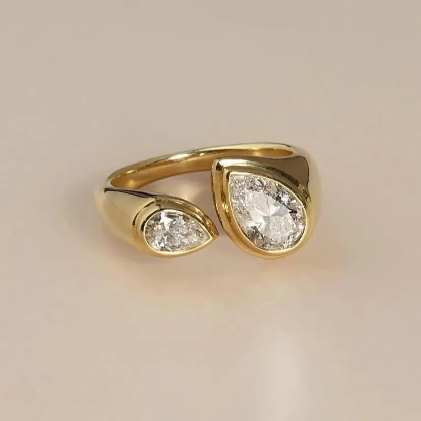 Pear Cut 1.30tcw Lab Grown Diamond Bezel Set Ring | Open Bypass Yellow Gold Design | IGI Certified