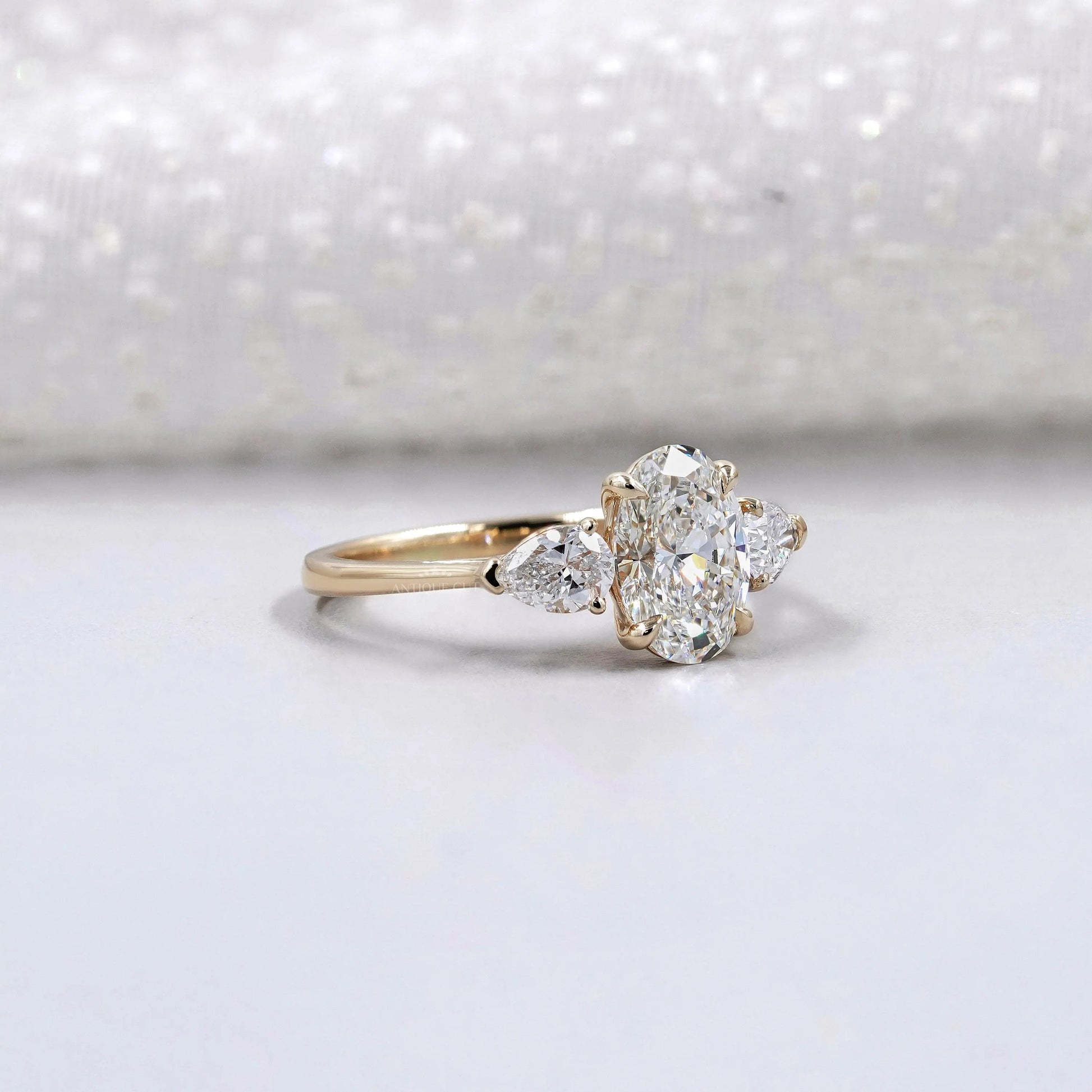 Oval Cut 2.00tcw Lab Grown Diamond Engagement Ring | Three Stone Pear Side Design | IGI Certified