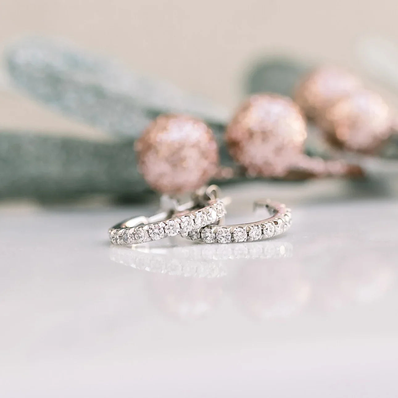 J HUGGIE HOOP EARRINGS