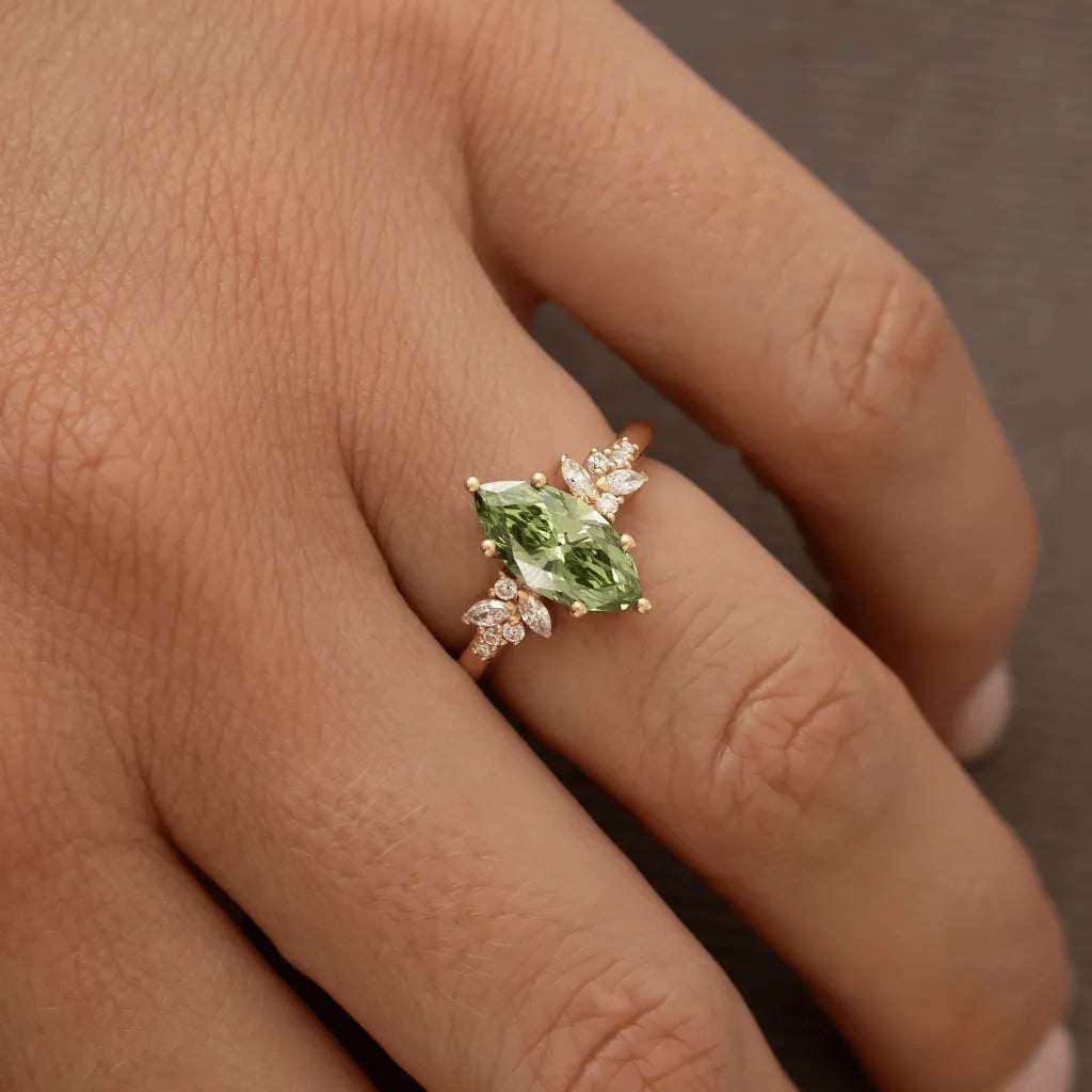 Common :: close up green marquise lab diamond ring floral cluster engagement ring