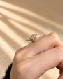 Common :: Marquise hidden halo engagement ring with a delicate 2MM band.