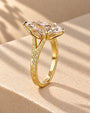 Common :: Vintage Marquise solitaire engagement ring with decorative scroll shoulders