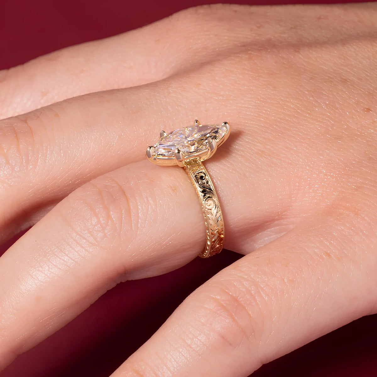 Common :: Vintage-inspired 2CT marquise solitaire engagement ring with a delicate 2MM band.