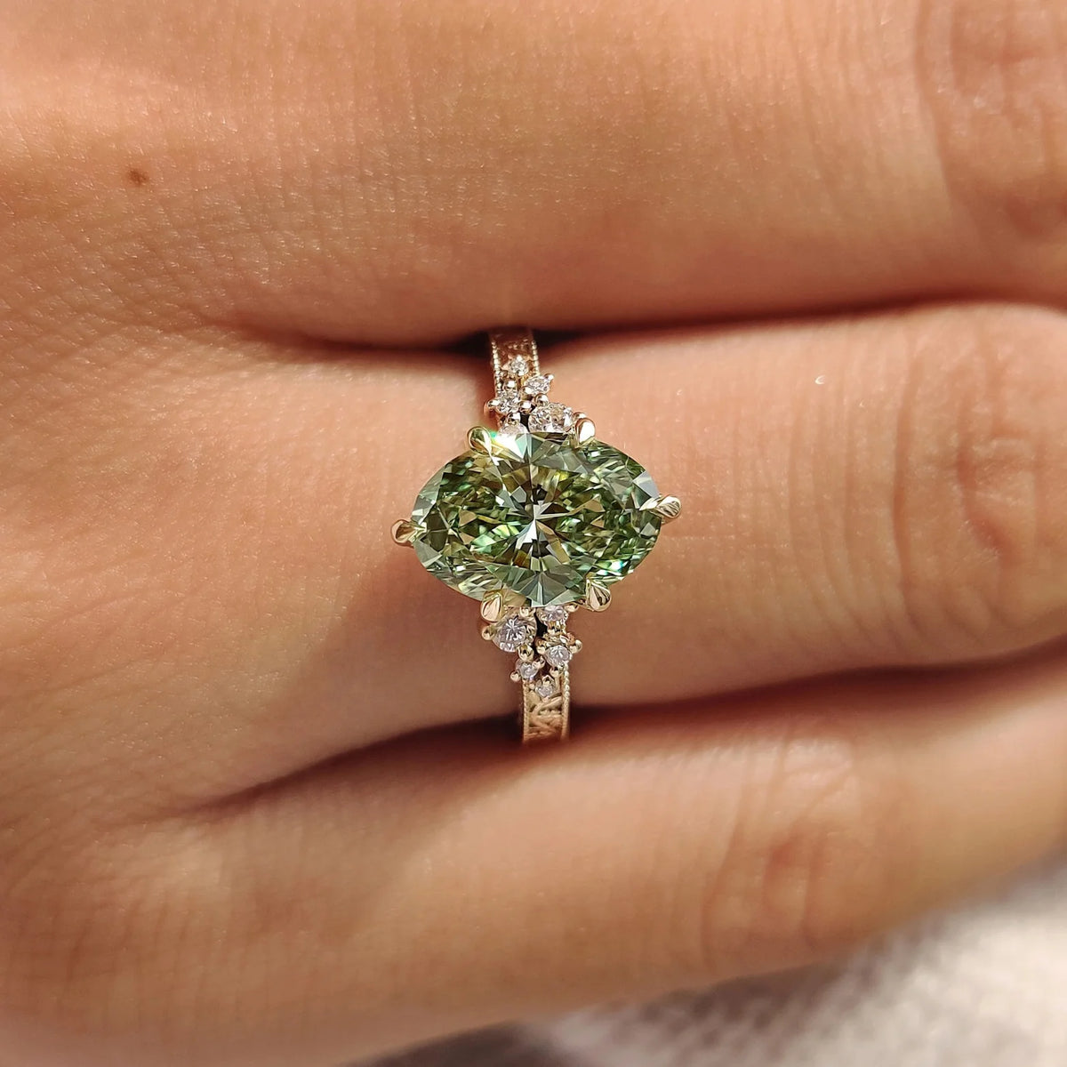 Common :: 1.10TCW vintage bridal ring with Green Oval center diamond