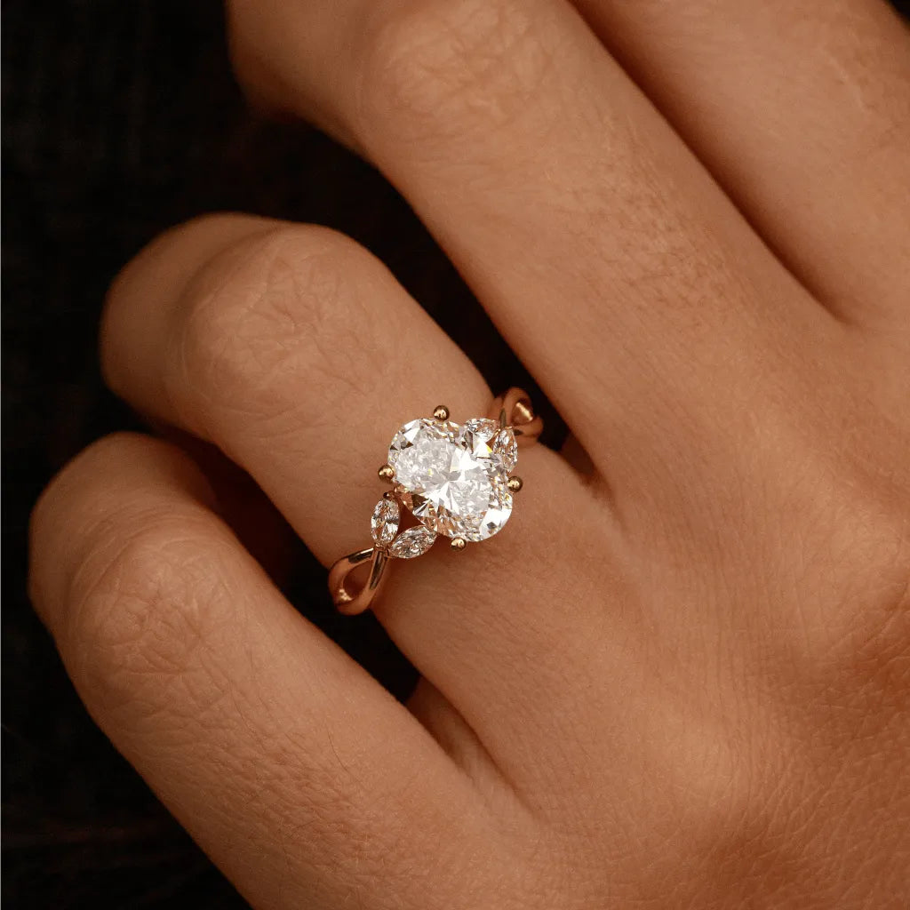 Common :: 1.90ct oval lab grown diamond ring with marquise diamond accents