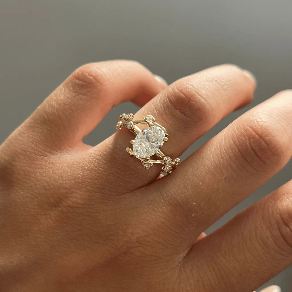 Common :: 1.50ct oval lab grown diamond floral engagement ring with round diamonds