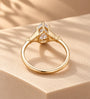 Common :: Pear and Round Lab Grown Diamond Three Stone Engagement Ring