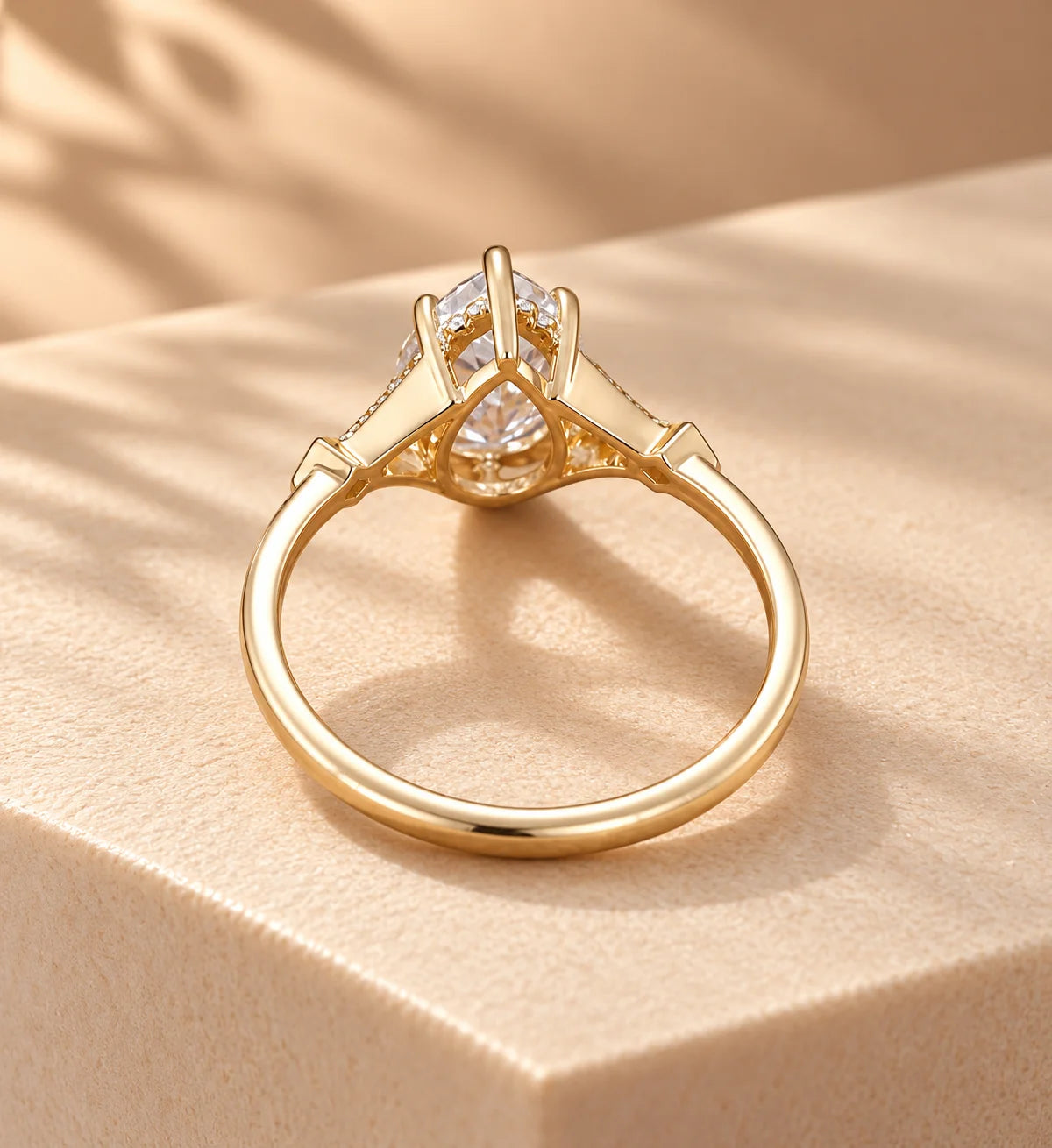 Common :: Pear and Round Lab Grown Diamond Three Stone Engagement Ring
