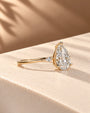 Common :: D VS1 Pear lab grown diamond Three Stone Ring with geometric Kite accents
