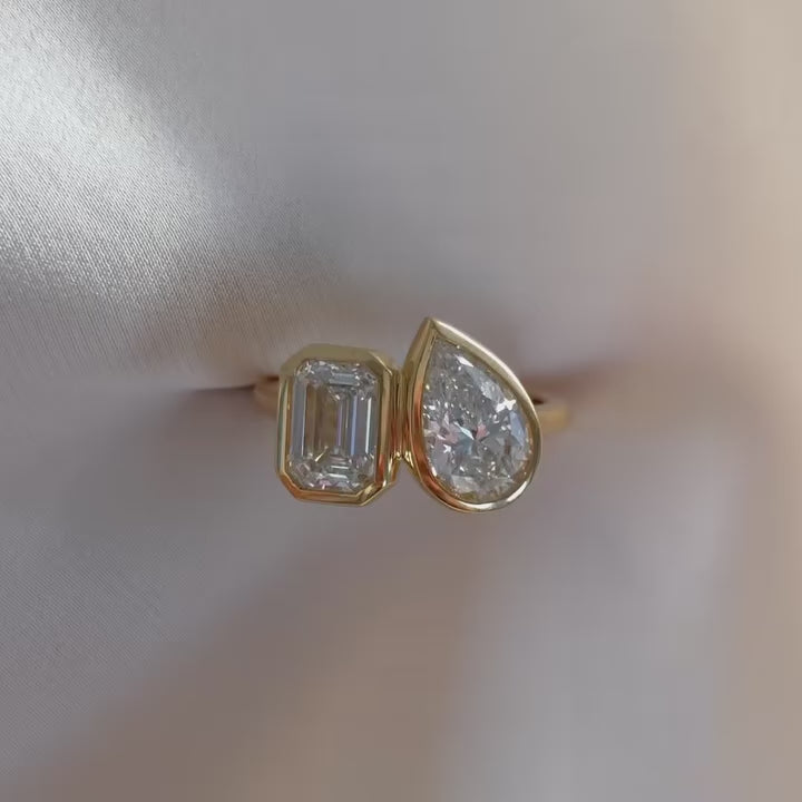 Common :: 1.50ct Pear and 1ct Emerald lab grown diamond ring showcase