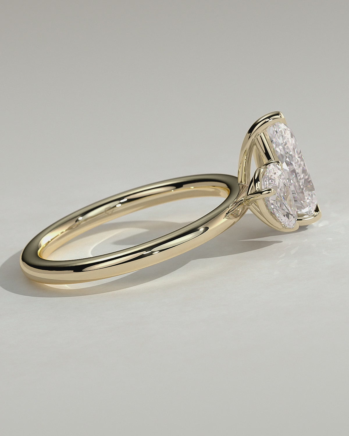 Yellow :: Serentique 0.5ct and 1.25ct pear toi et moi lab grown diamond engagement ring 360 view yellow gold IGI certified two stone ring