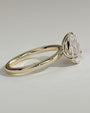 Yellow :: Velserae pear and princess toi et moi lab grown diamond engagement ring 360 view yellow gold IGI certified two stone ring