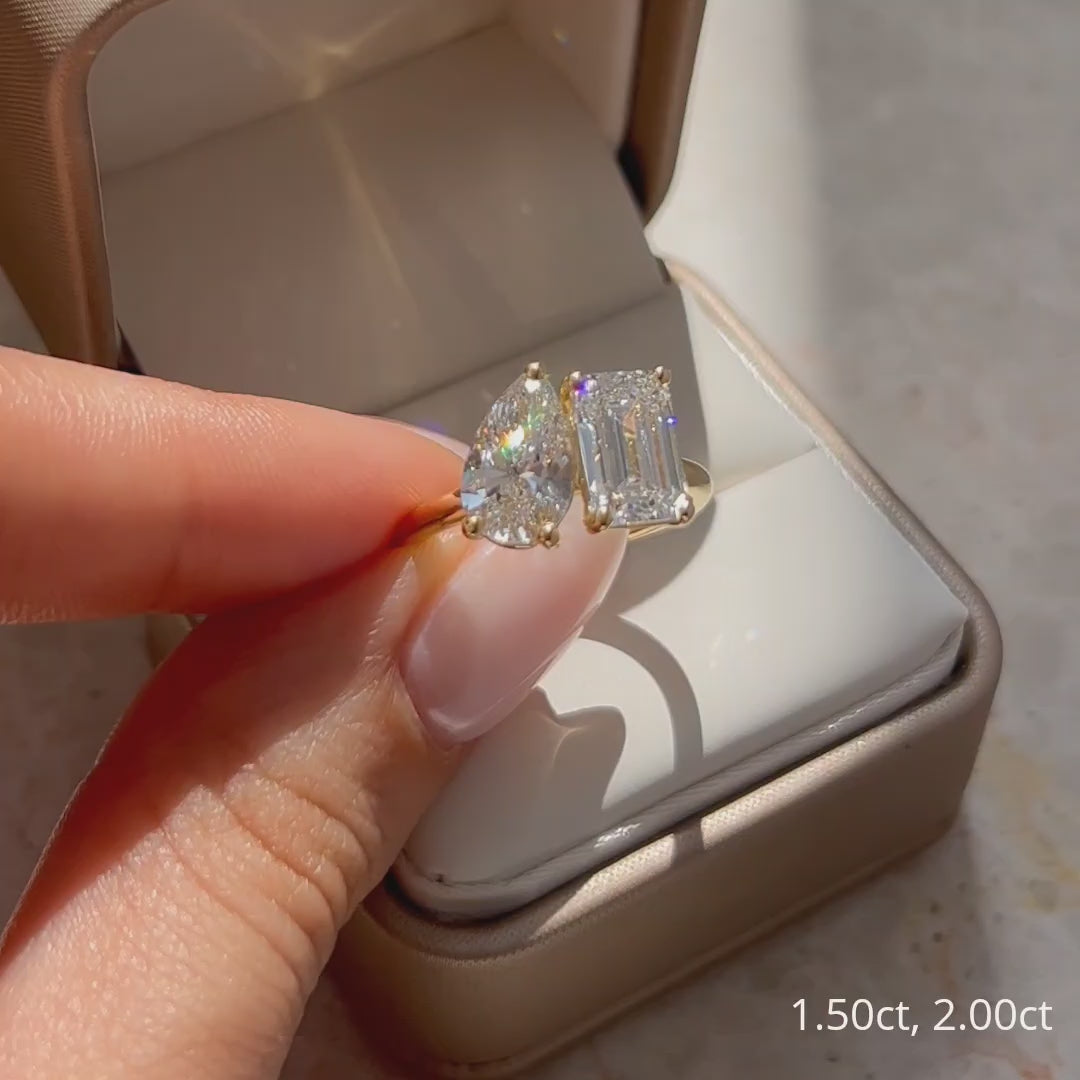 Common :: Luxury two stone ring with a 2 carat emerald cut and 1.50 carat pear cut lab diamond.