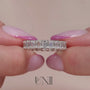 Common :: 5ct emerald cut lab grown diamond eternity ring in white gold featuring IGI certified diamonds. An ultra luxury full band with U-prong setting for maximum light exposure, delivering bold step-cut brilliance and statement styling.