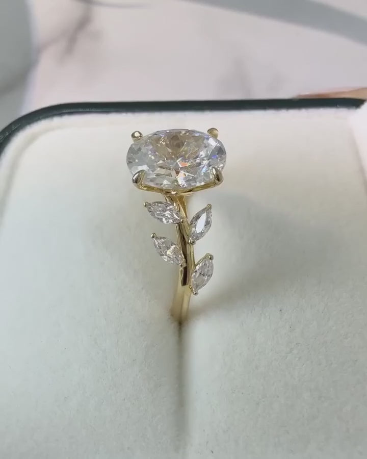 Common :: 2ct Oval lab grown diamond with eight Marquise accents showcase