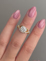 Common :: 1.80ct Round diamond with flowing pavé shoulders showcase