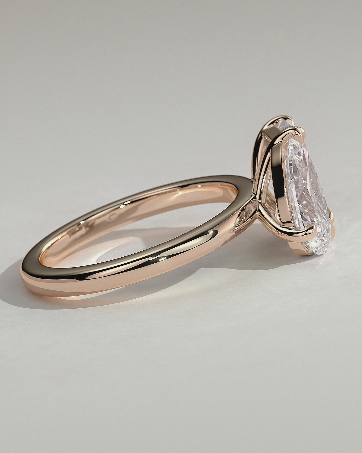 Rose :: Arviquea 1.5ct pear and 1.8ct radiant toi et moi lab grown diamond engagement ring 360 view rose gold IGI certified two stone ring