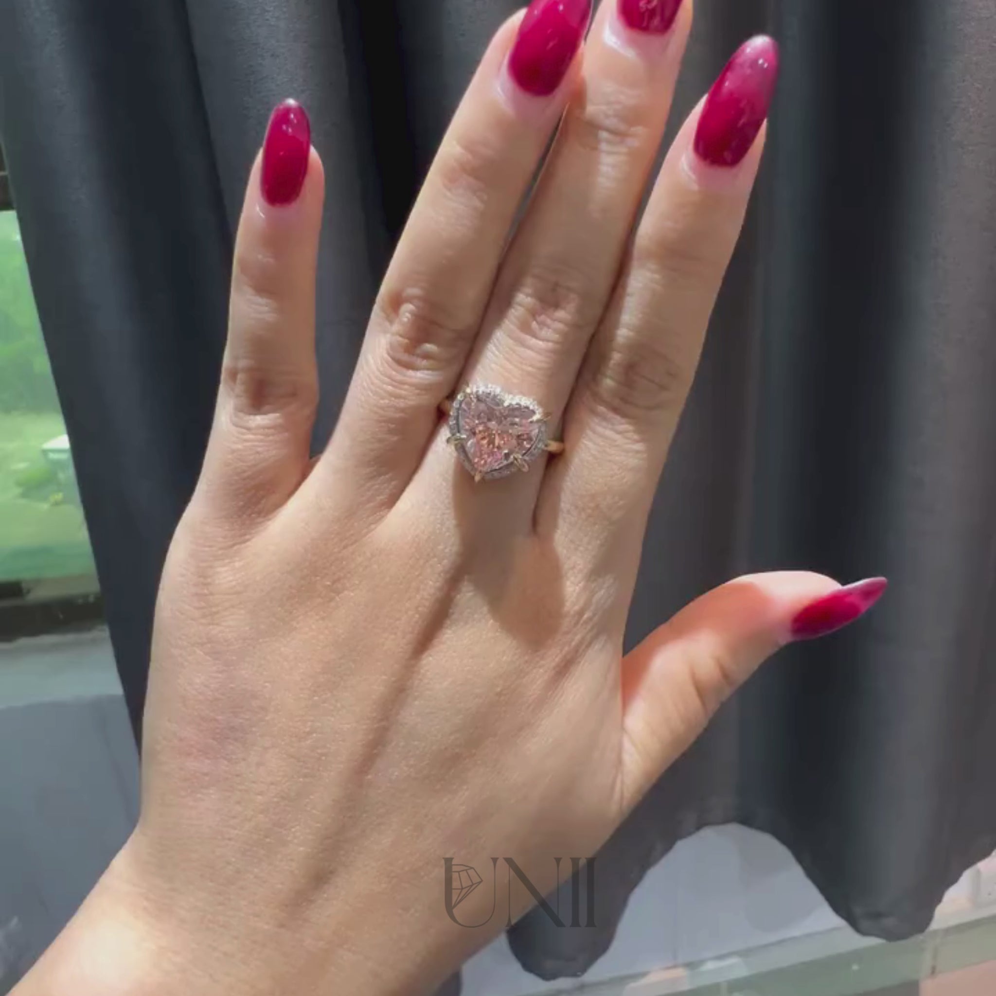 Common :: 4.08ct pink Heart lab grown diamond engagement ring close up